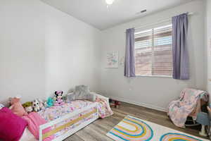 Bedroom featuring hardwood / wood-style floors