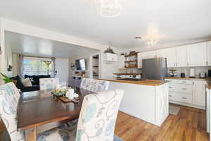 Dining area featuring light hardwood / wood-style floors