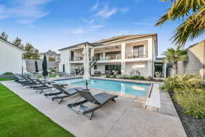 View of pool with a patio area