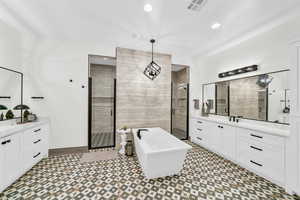 Bathroom with vanity and independent shower and bath