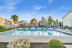 View of pool with a patio area