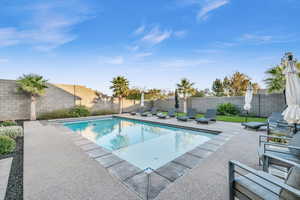 View of pool with a patio area