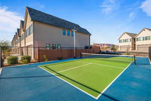 View of sport court featuring basketball court