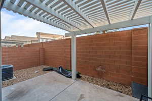 View of patio featuring cooling unit