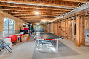 Recreation room with concrete flooring