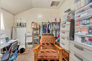 Interior space featuring lofted ceiling