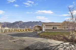 Exterior space featuring a mountain view