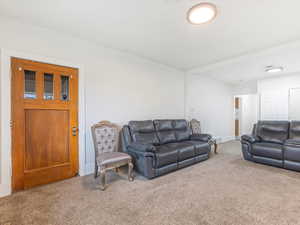 Living room with carpet floors