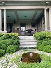 Property entrance with a porch