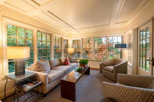 Sunroom / solarium with plenty of natural light and coffered ceiling