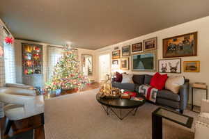 Living room with hardwood / wood-style floors