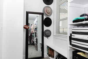 Mudroom featuring carpet