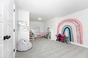 Playroom featuring carpet floors