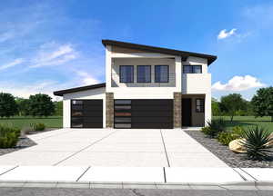 Contemporary home featuring a garage