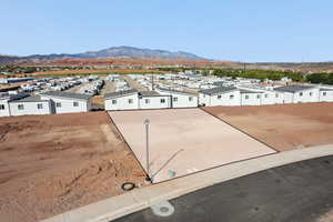 Birds eye view of property with a mountain view