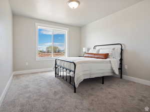 View of carpeted bedroom