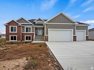 View of front facade with a garage