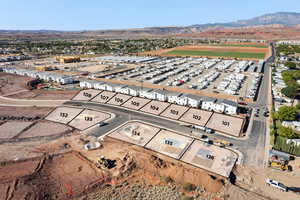 Birds eye view of property with a mountain view