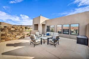 View of patio / terrace with a mountain view and an outdoor hangout area