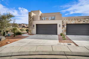 View of front of home with a balcony