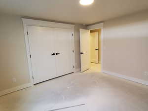 Unfurnished bedroom featuring a closet