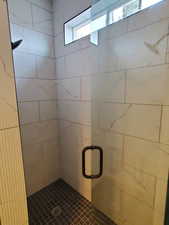 Bathroom featuring walk in shower