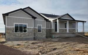 View of front of property with covered porch