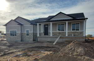 View of front of home with covered porch