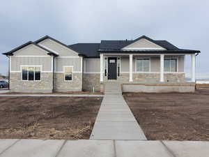 View of front of property featuring a porch