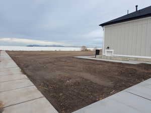 View of yard with a mountain view