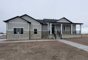 View of front of property featuring covered porch