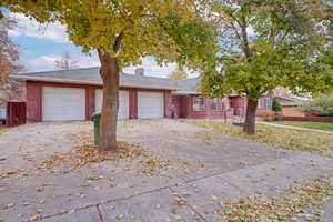 View of front of house with a garage