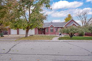 View of front of home featuring a garage