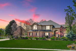 View of front of home featuring a lawn