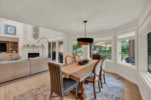 Dining space with light wood-type flooring