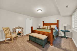 View of carpeted bedroom