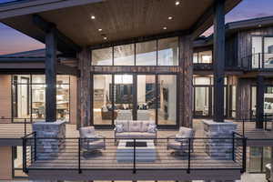 Patio terrace at dusk with an outdoor living space