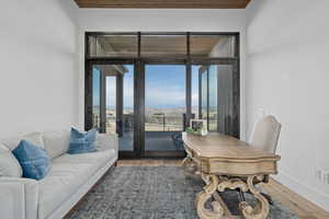 Interior space with a mountain view and wood-type flooring