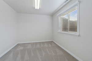 Spare room with light carpet