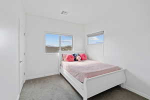 View of carpeted bedroom