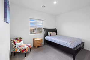 Bedroom featuring carpet flooring