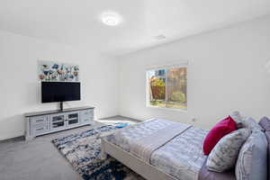 View of carpeted bedroom