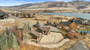 Bird's eye view with a water and mountain view