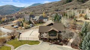 Birds eye view of property with a mountain view