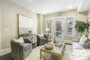 Living area with hardwood / wood-style flooring