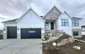 View of front of property with a garage