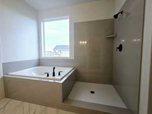 Bathroom with plus walk in shower