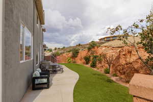 View of yard featuring a patio