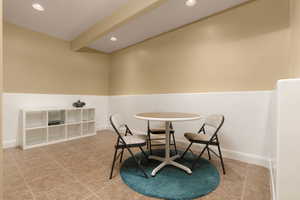 Dining area featuring beamed ceiling