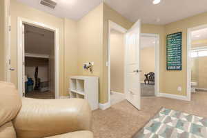 Bathroom featuring tile patterned flooring and toilet